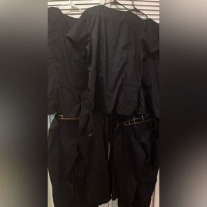 Women’s Cherokee brand black scrubs. 3 sets. Size L.